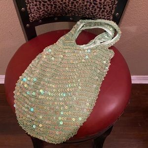 Shimmering light green handbag